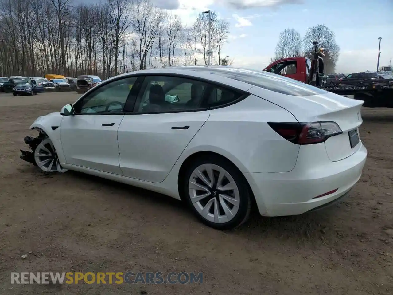 2 Photograph of a damaged car 5YJ3E1EB8NF338169 TESLA MODEL 3 2022