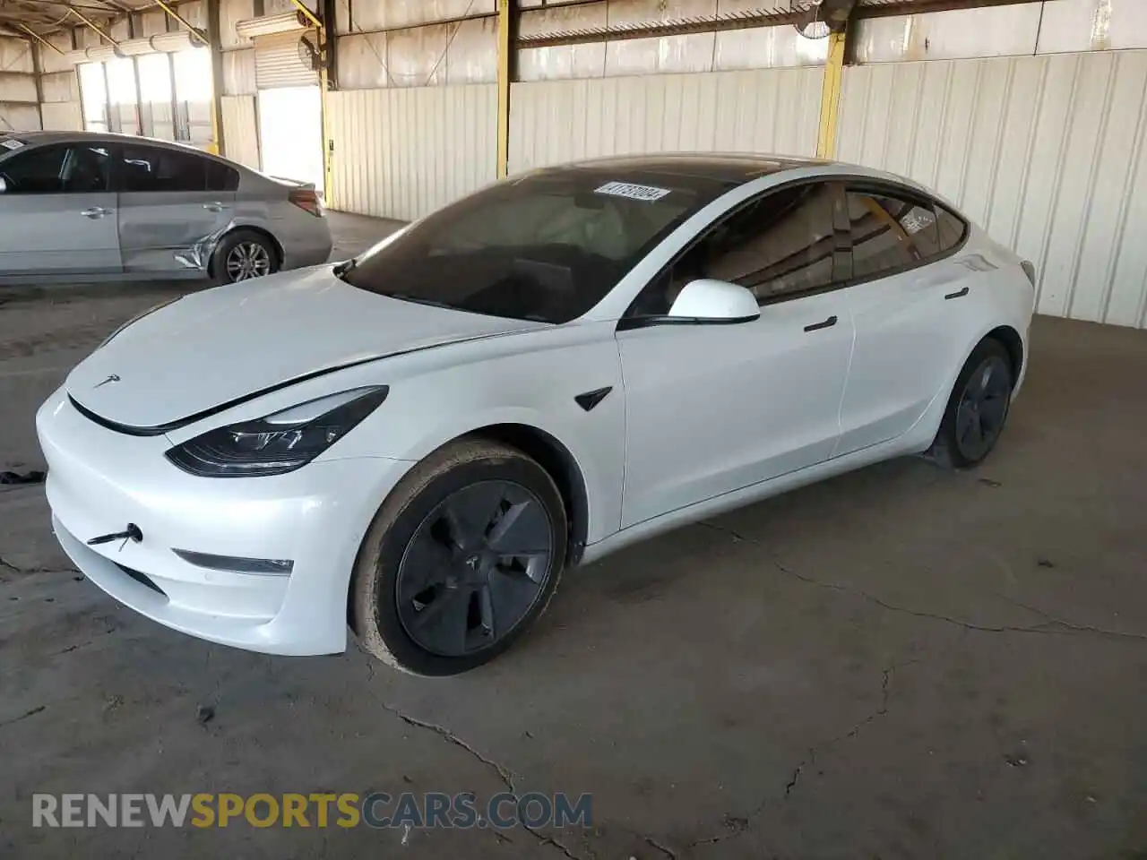 1 Photograph of a damaged car 5YJ3E1EB9NF103084 TESLA MODEL 3 2022