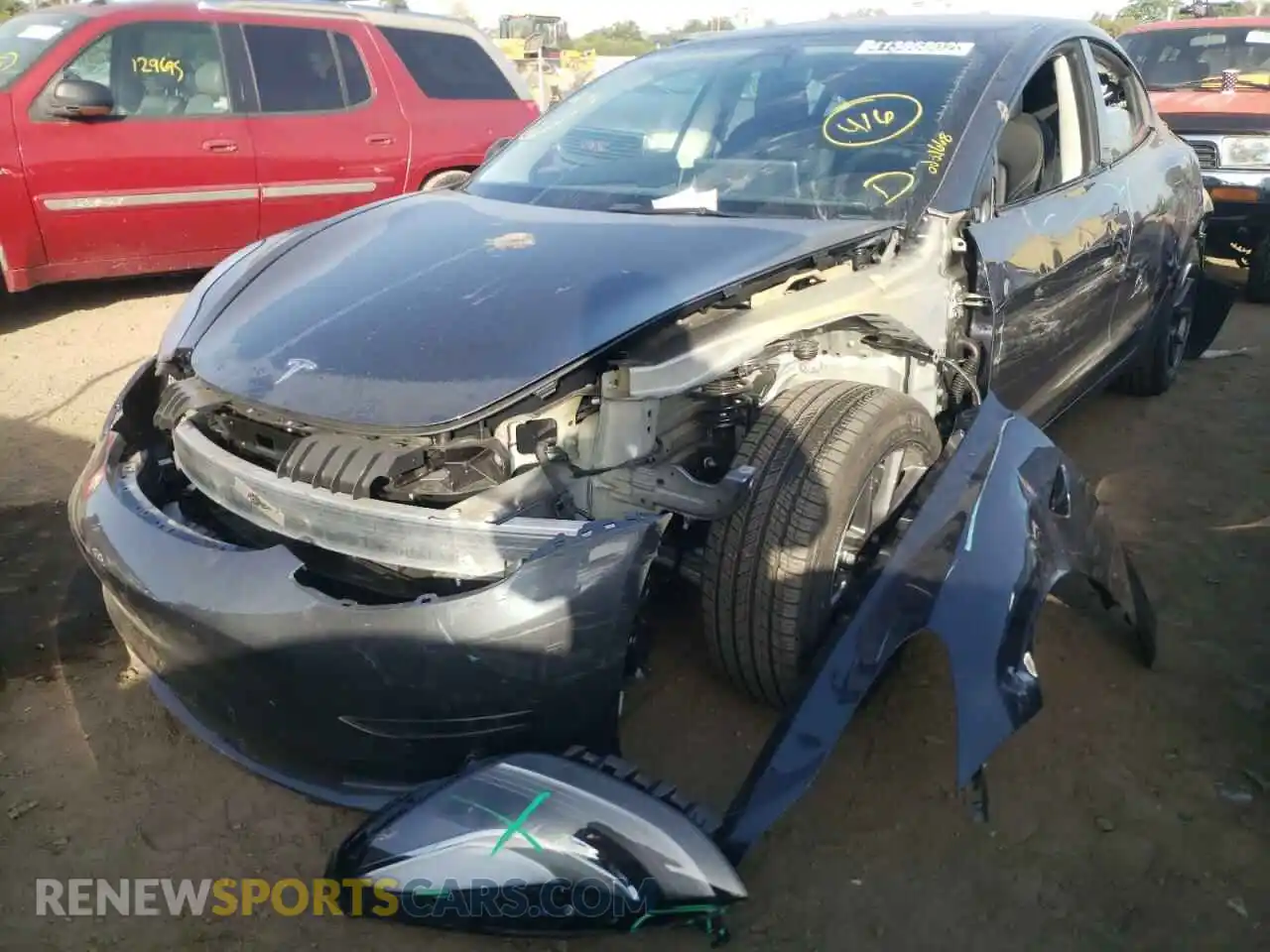 2 Photograph of a damaged car 5YJ3E1EB9NF123853 TESLA MODEL 3 2022