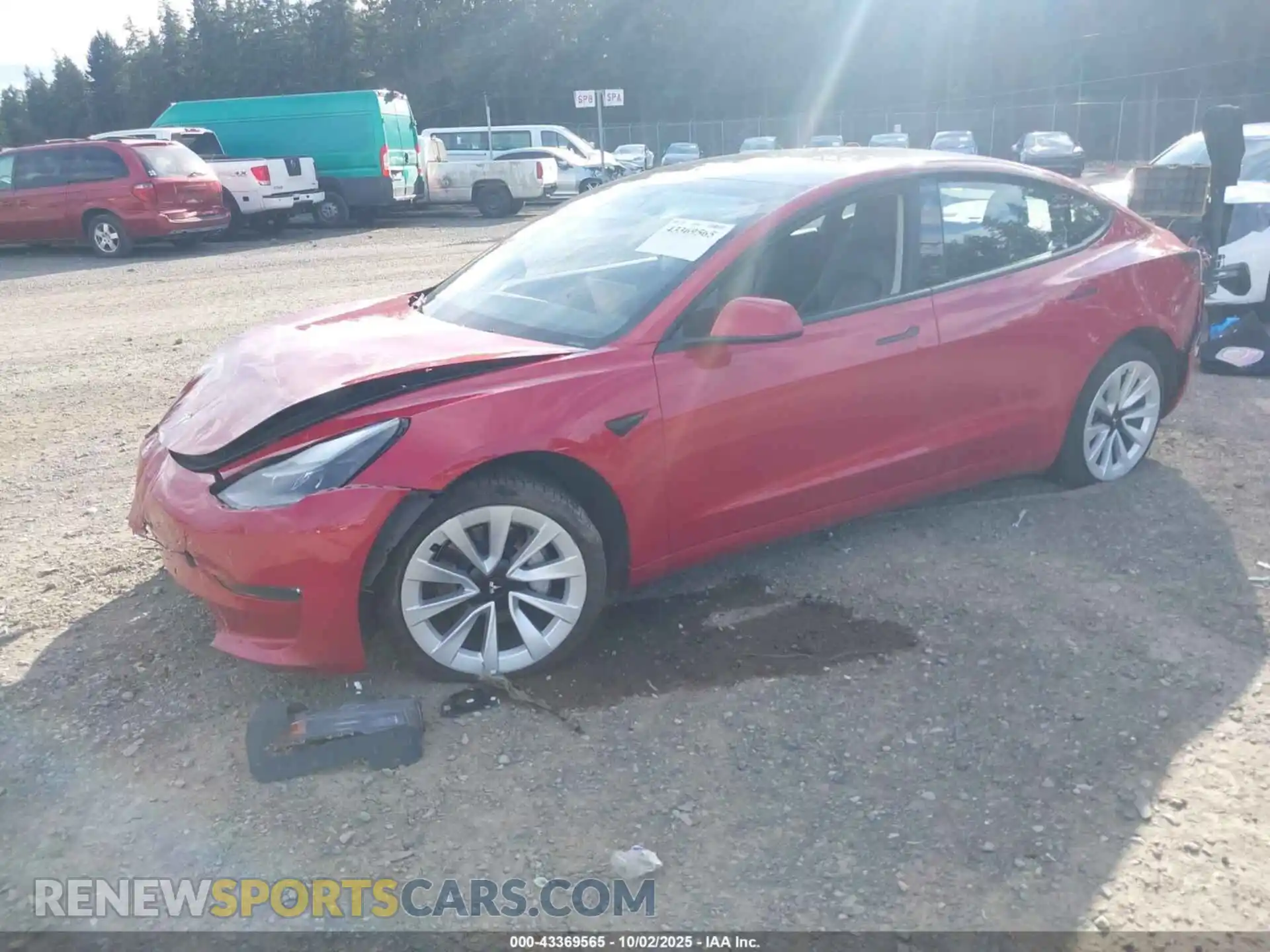 2 Photograph of a damaged car 5YJ3E1EB9NF128082 TESLA MODEL 3 2022