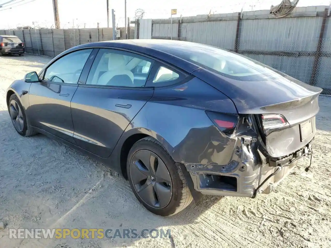 2 Photograph of a damaged car 5YJ3E1EB9NF128356 TESLA MODEL 3 2022