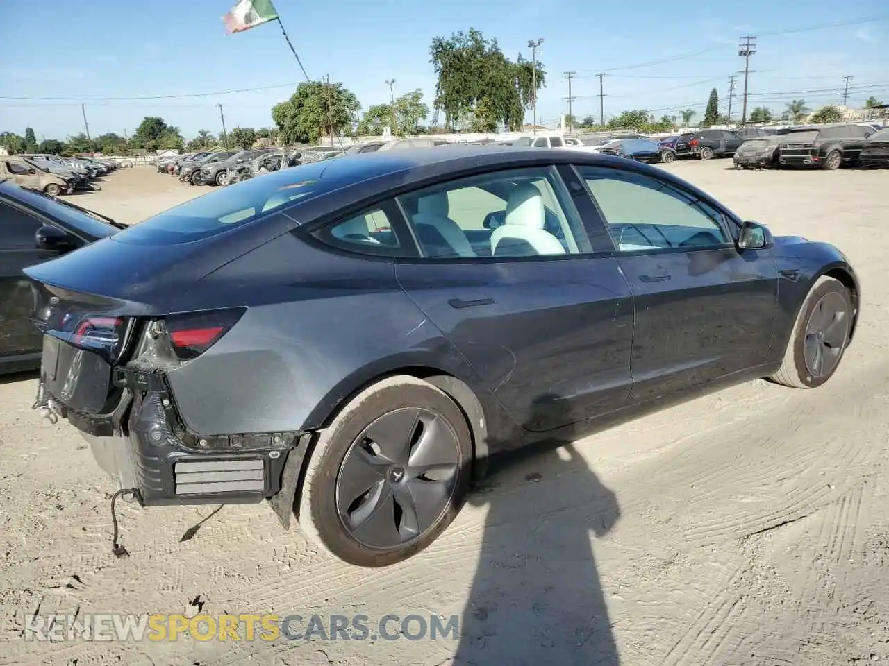 3 Photograph of a damaged car 5YJ3E1EB9NF128356 TESLA MODEL 3 2022