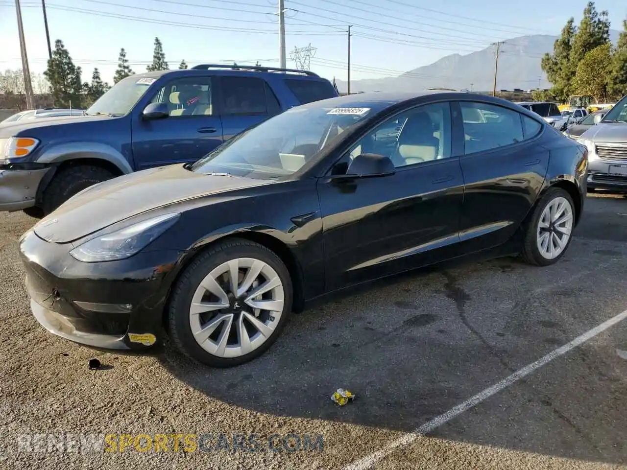 1 Photograph of a damaged car 5YJ3E1EB9NF131421 TESLA MODEL 3 2022