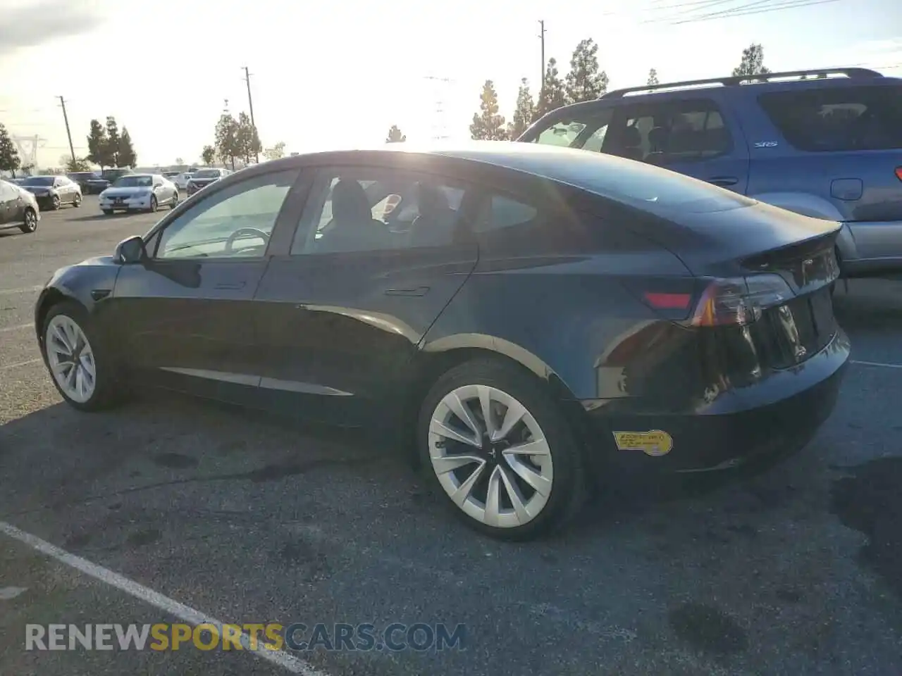 2 Photograph of a damaged car 5YJ3E1EB9NF131421 TESLA MODEL 3 2022