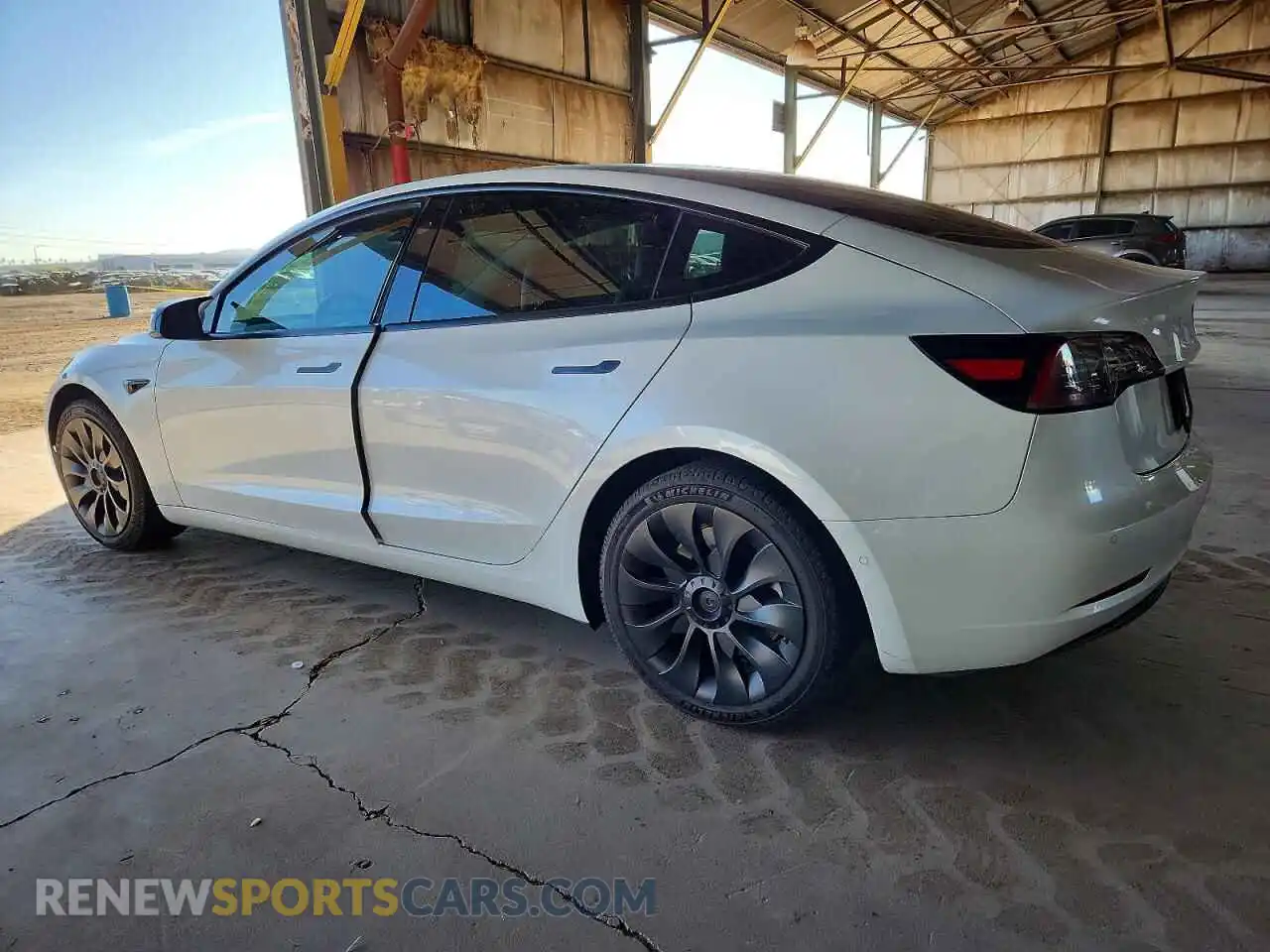 2 Photograph of a damaged car 5YJ3E1EB9NF132990 TESLA MODEL 3 2022