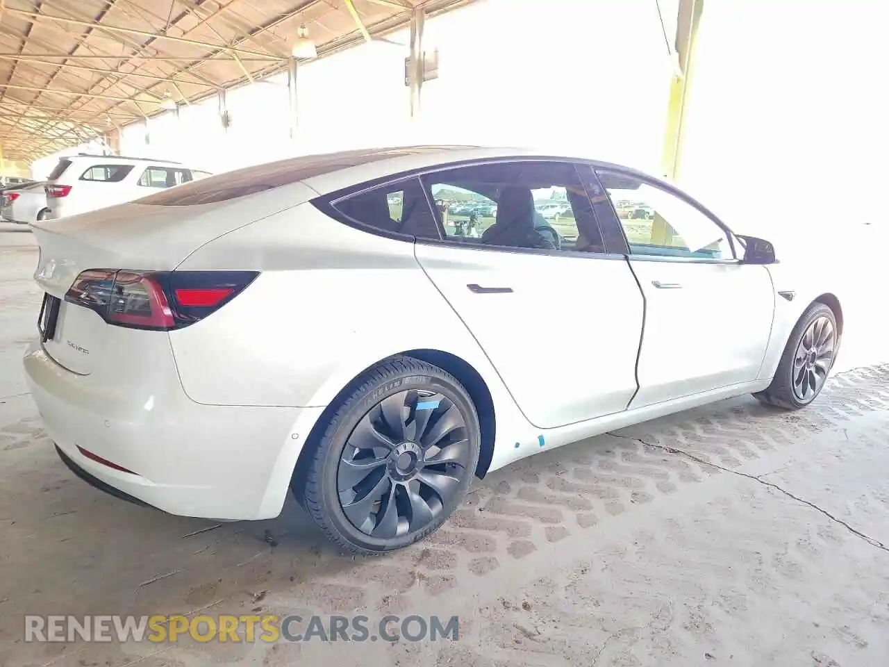 3 Photograph of a damaged car 5YJ3E1EB9NF132990 TESLA MODEL 3 2022