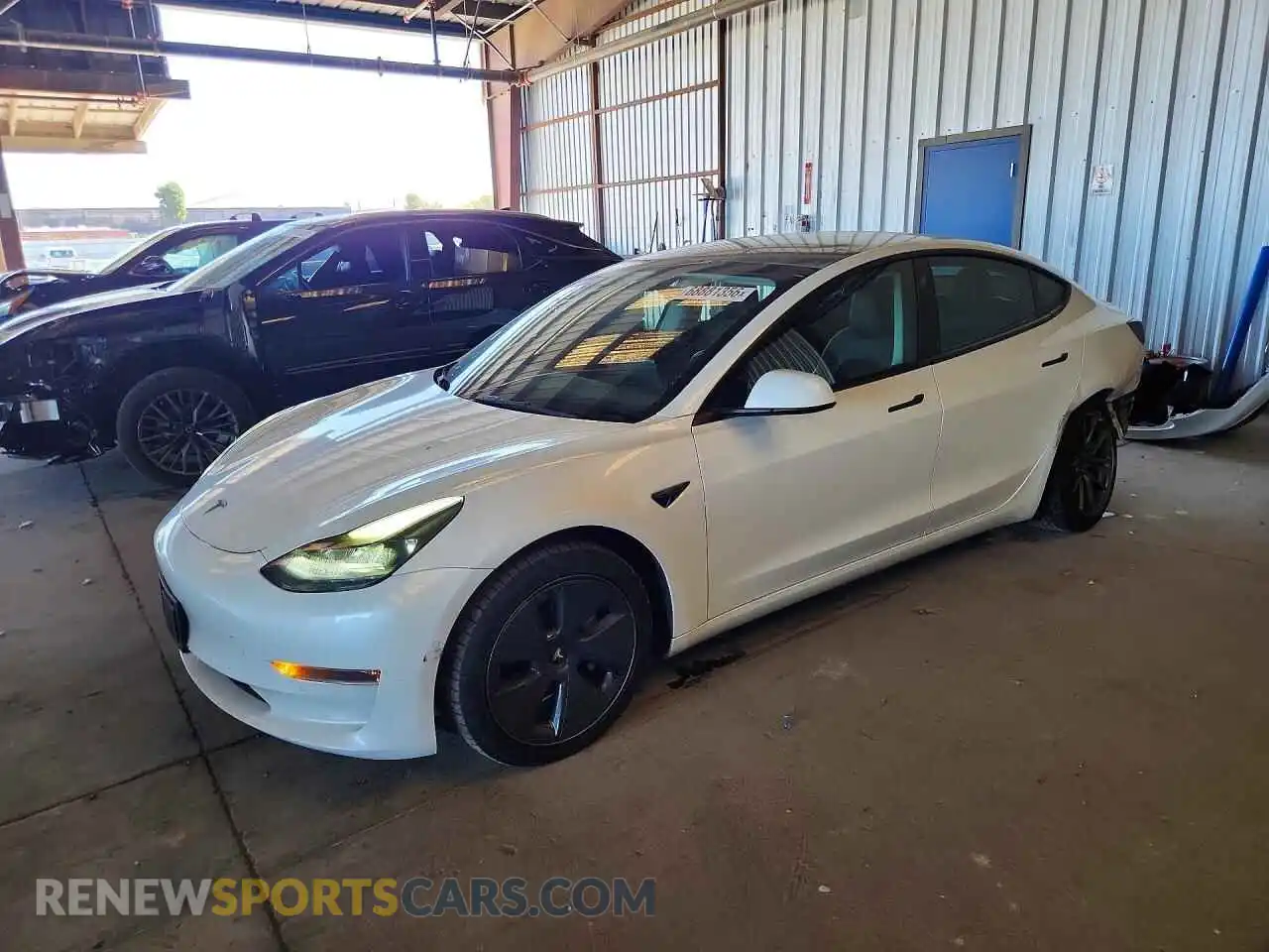 1 Photograph of a damaged car 5YJ3E1EB9NF134142 TESLA MODEL 3 2022