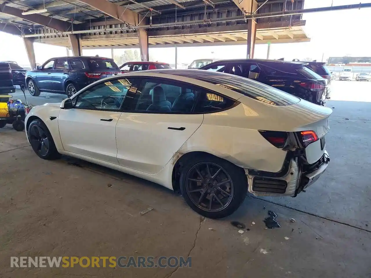 2 Photograph of a damaged car 5YJ3E1EB9NF134142 TESLA MODEL 3 2022