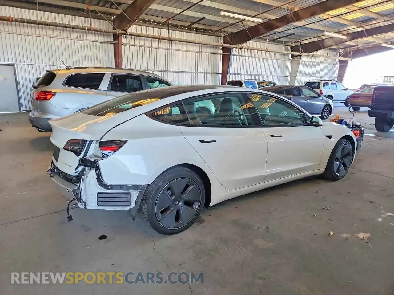 3 Photograph of a damaged car 5YJ3E1EB9NF134142 TESLA MODEL 3 2022