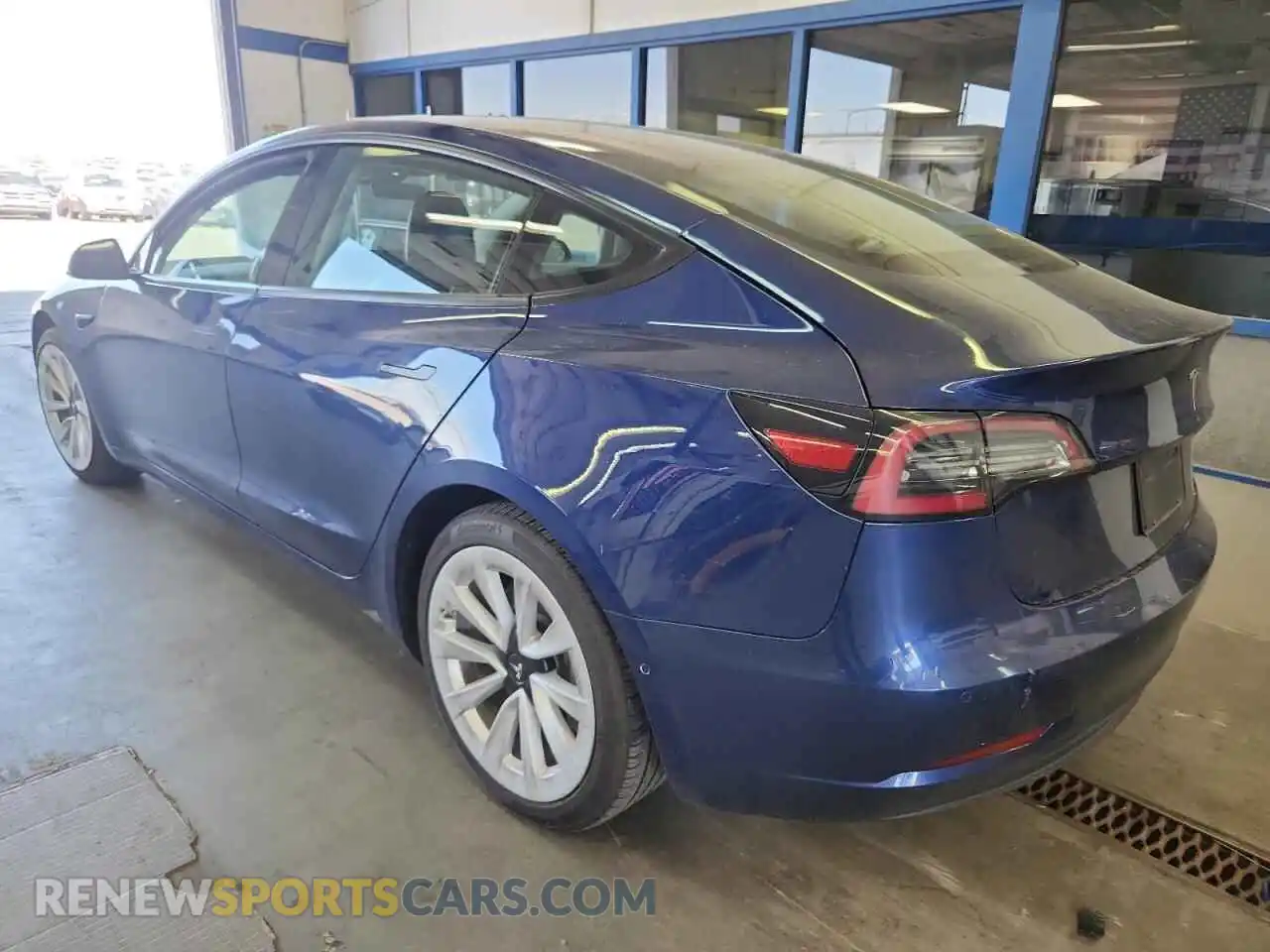 2 Photograph of a damaged car 5YJ3E1EB9NF144458 TESLA MODEL 3 2022