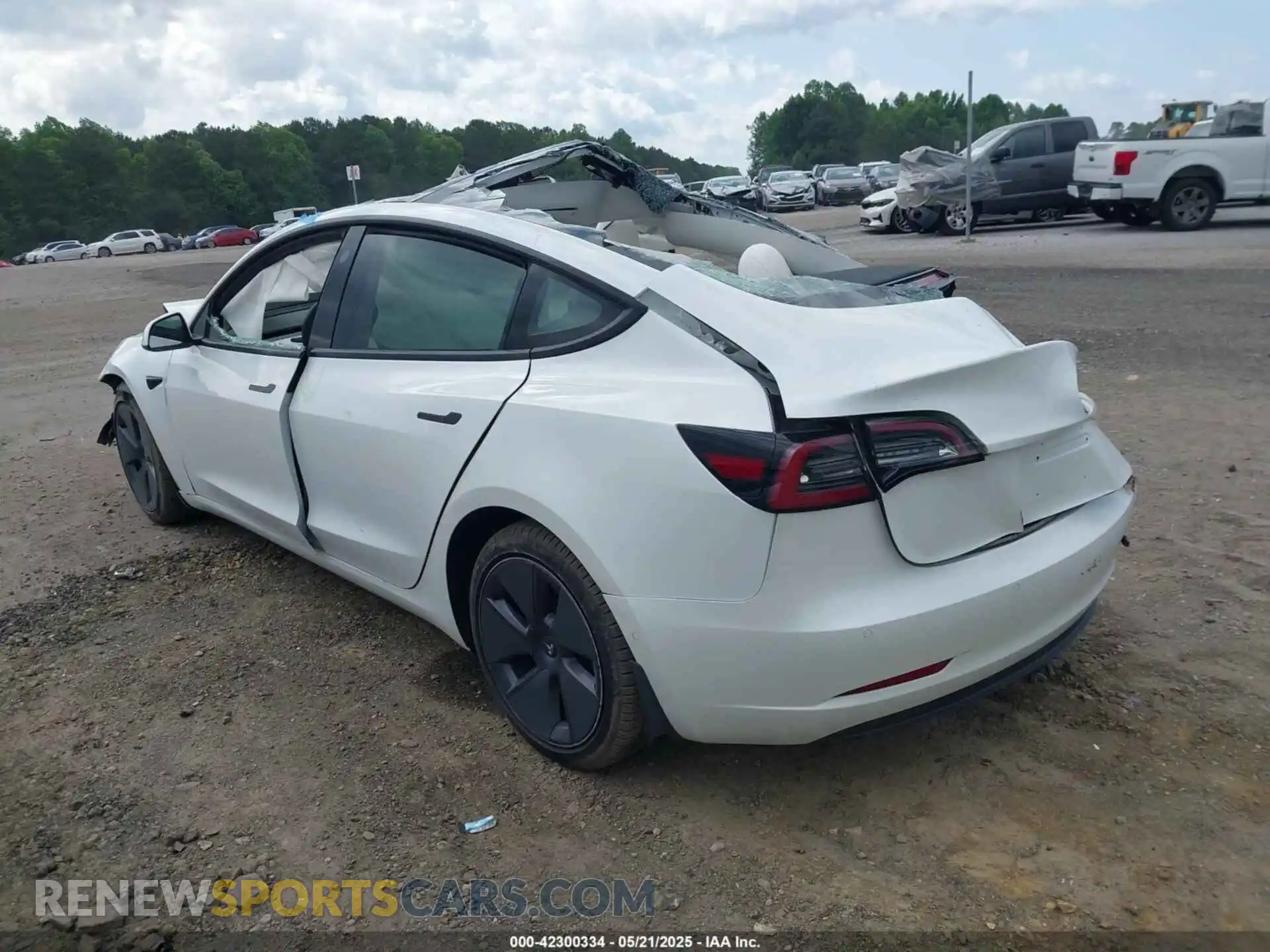 3 Photograph of a damaged car 5YJ3E1EB9NF155394 TESLA MODEL 3 2022