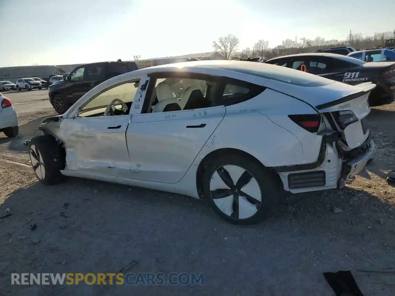 2 Photograph of a damaged car 5YJ3E1EB9NF169974 TESLA MODEL 3 2022