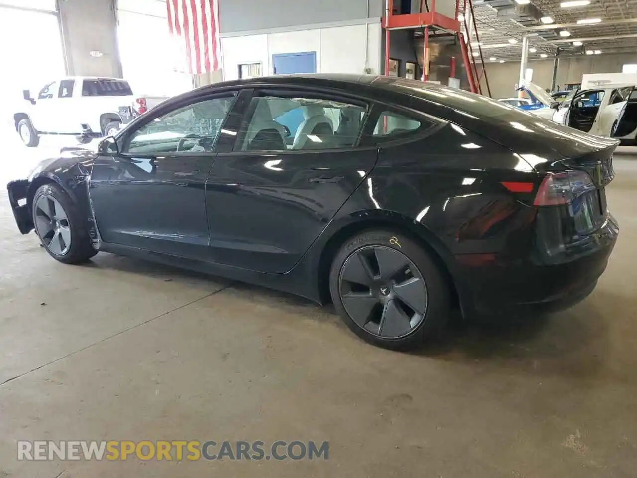 2 Photograph of a damaged car 5YJ3E1EB9NF180392 TESLA MODEL 3 2022