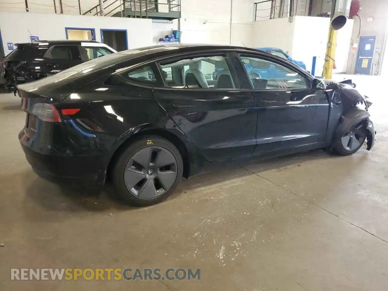 3 Photograph of a damaged car 5YJ3E1EB9NF180392 TESLA MODEL 3 2022