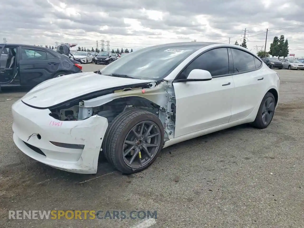 1 Photograph of a damaged car 5YJ3E1EB9NF183499 TESLA MODEL 3 2022
