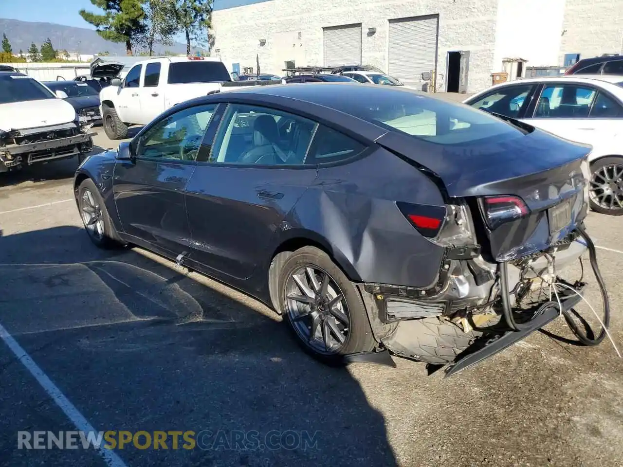 2 Photograph of a damaged car 5YJ3E1EB9NF184006 TESLA MODEL 3 2022