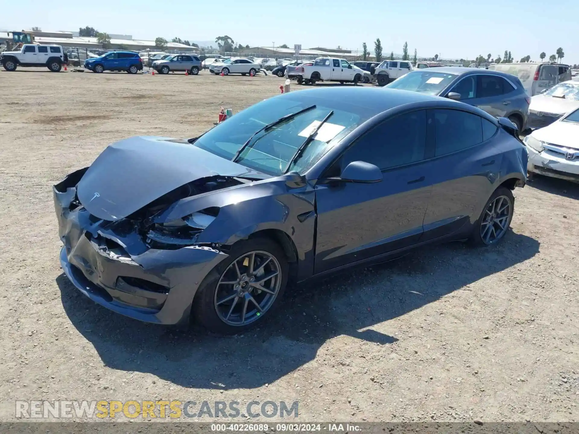 2 Photograph of a damaged car 5YJ3E1EB9NF184247 TESLA MODEL 3 2022
