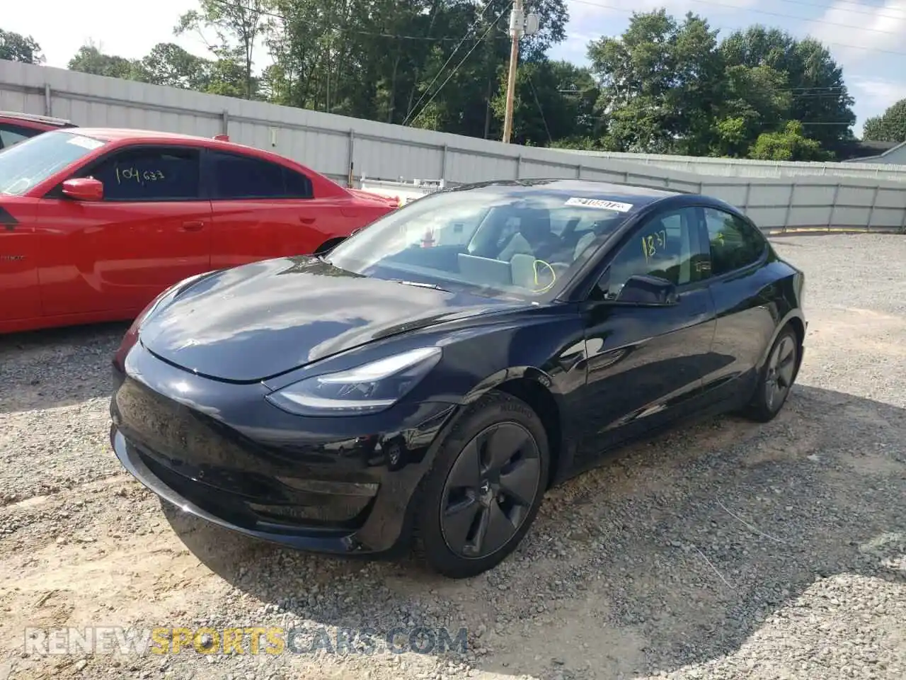 2 Photograph of a damaged car 5YJ3E1EB9NF185527 TESLA MODEL 3 2022