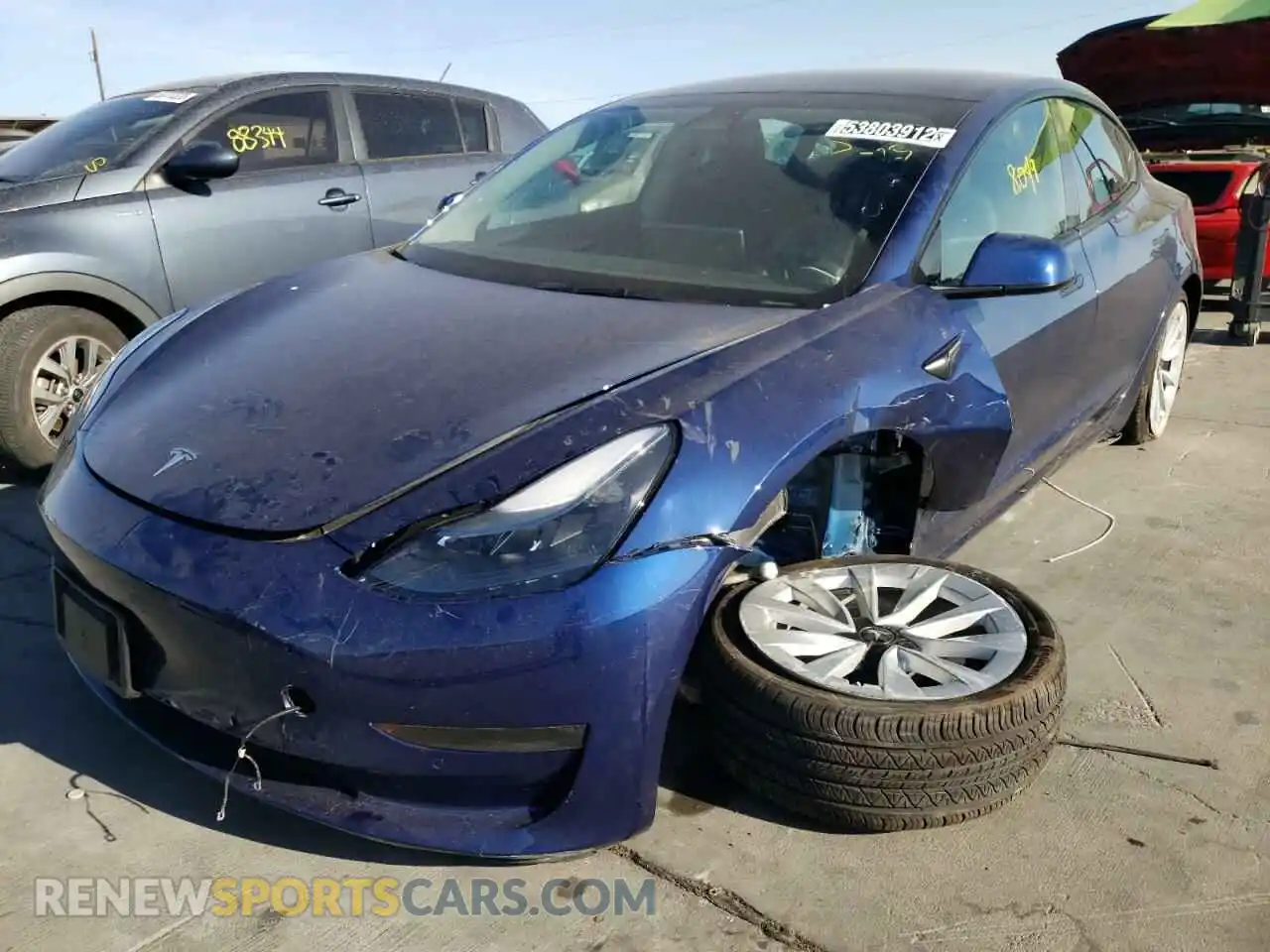 2 Photograph of a damaged car 5YJ3E1EB9NF185642 TESLA MODEL 3 2022