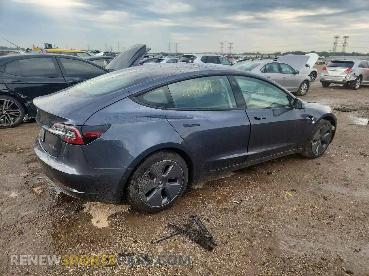 3 Photograph of a damaged car 5YJ3E1EB9NF201452 TESLA MODEL 3 2022