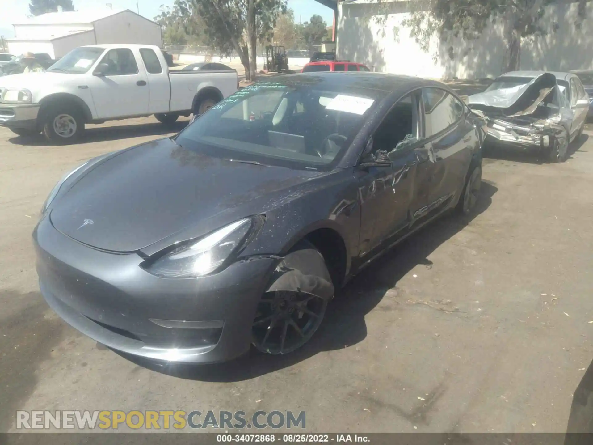 2 Photograph of a damaged car 5YJ3E1EB9NF222009 TESLA MODEL 3 2022