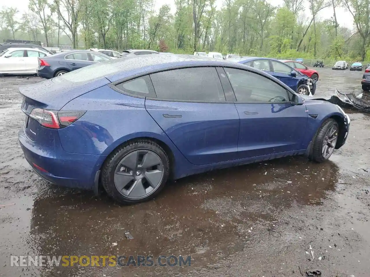 3 Photograph of a damaged car 5YJ3E1EB9NF232474 TESLA MODEL 3 2022