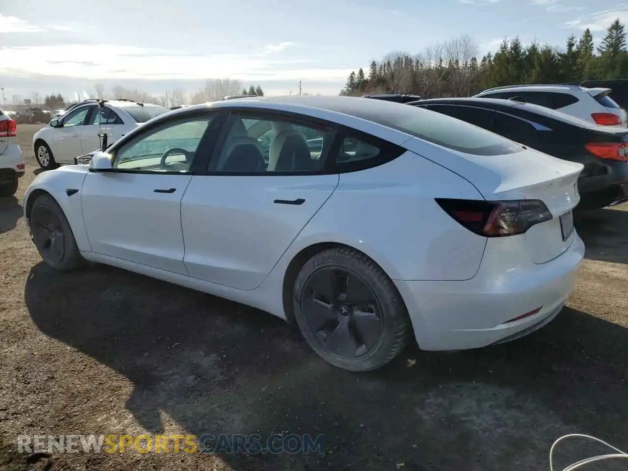 2 Photograph of a damaged car 5YJ3E1EB9NF239876 TESLA MODEL 3 2022