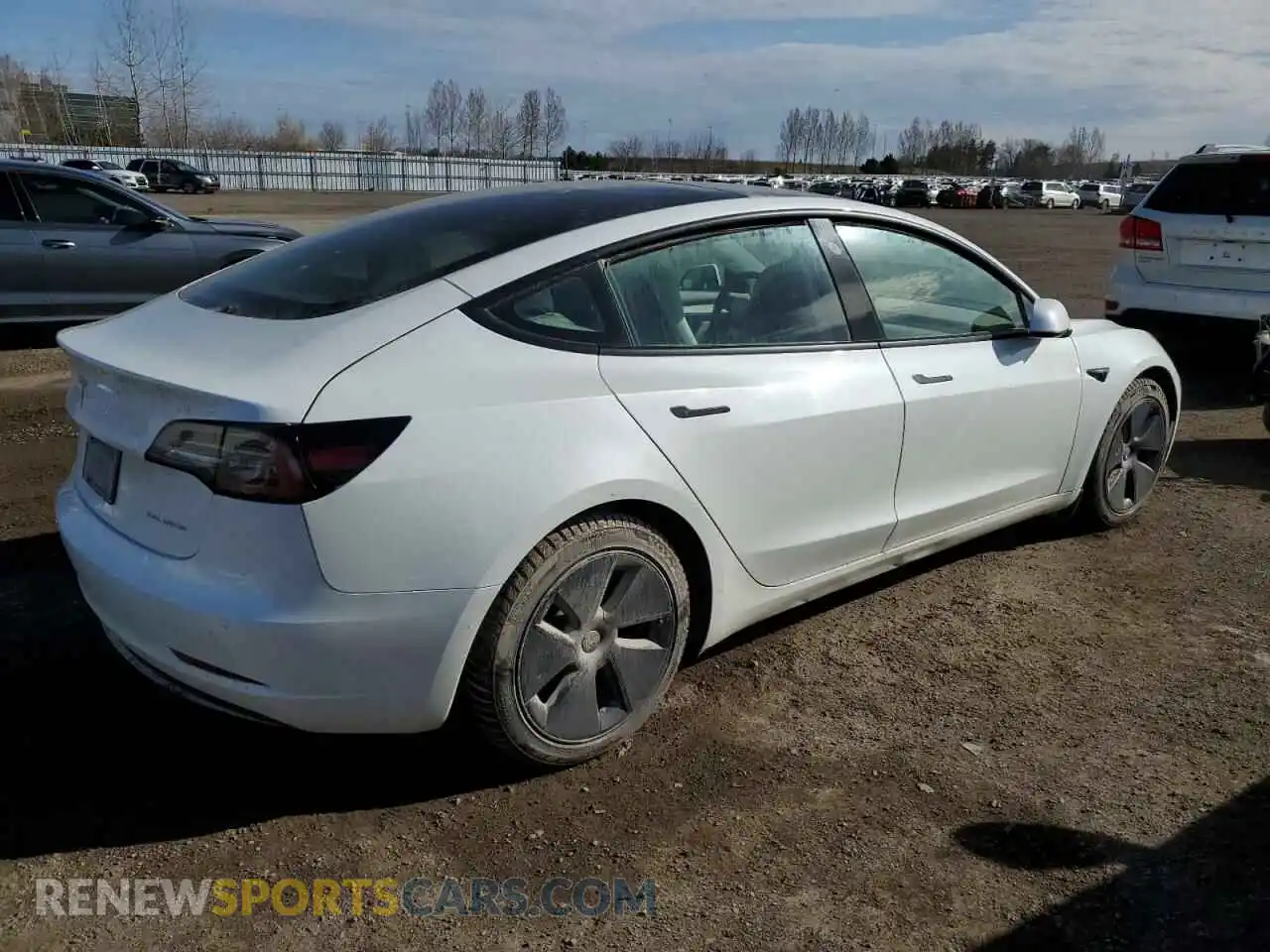 3 Photograph of a damaged car 5YJ3E1EB9NF239876 TESLA MODEL 3 2022