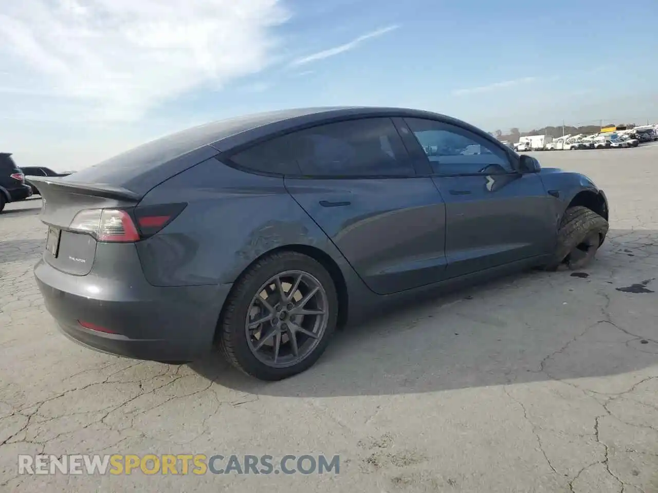 3 Photograph of a damaged car 5YJ3E1EB9NF241711 TESLA MODEL 3 2022
