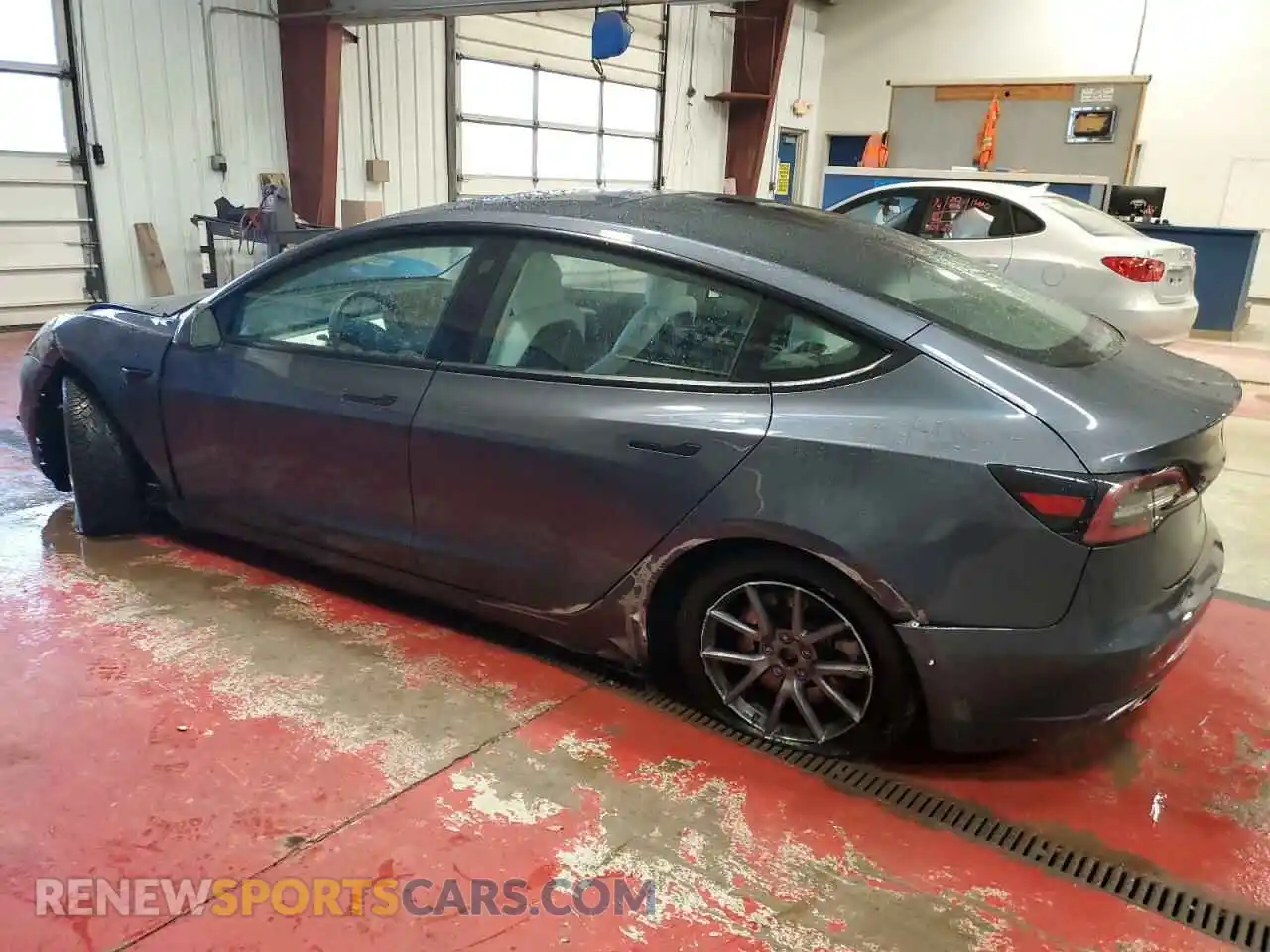 2 Photograph of a damaged car 5YJ3E1EB9NF249727 TESLA MODEL 3 2022