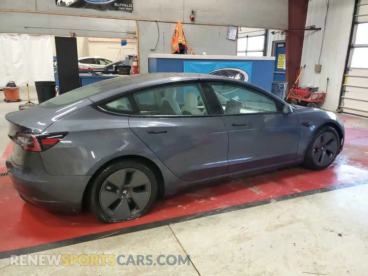 3 Photograph of a damaged car 5YJ3E1EB9NF249727 TESLA MODEL 3 2022