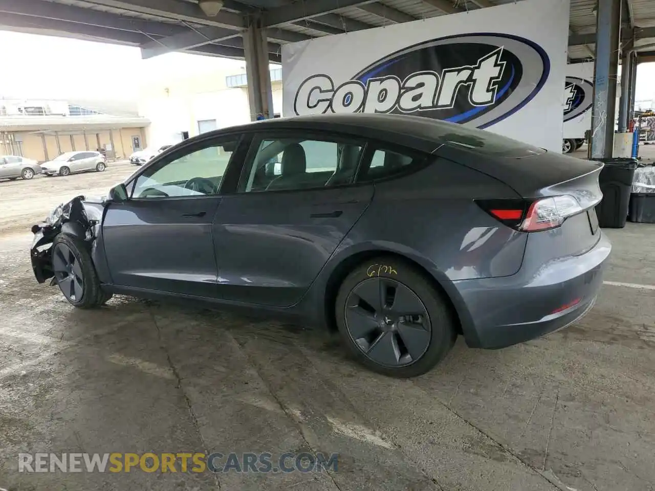 2 Photograph of a damaged car 5YJ3E1EB9NF263241 TESLA MODEL 3 2022