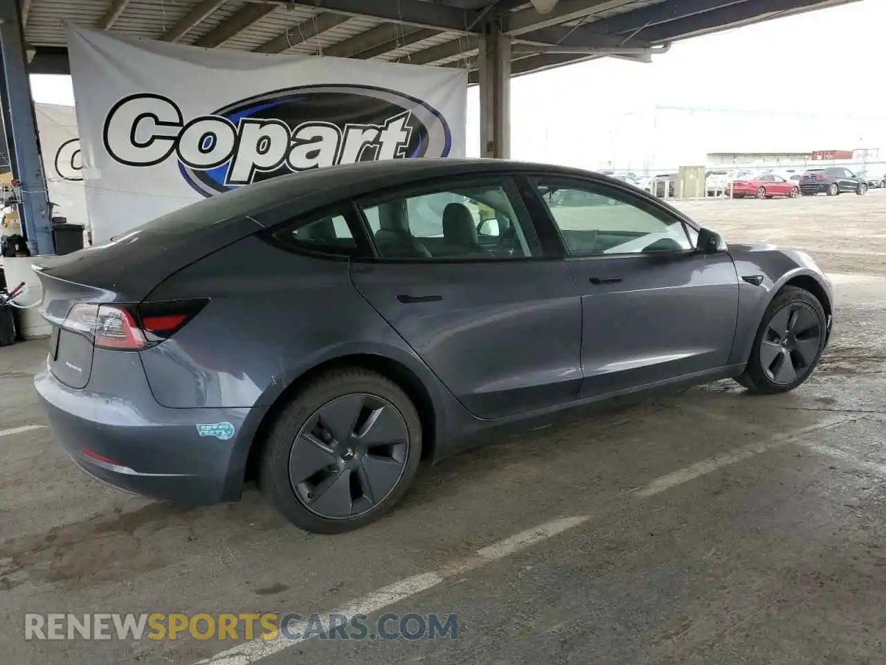 3 Photograph of a damaged car 5YJ3E1EB9NF263241 TESLA MODEL 3 2022