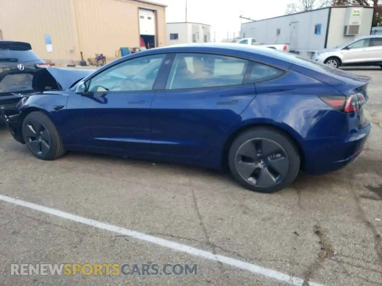 2 fotografías del automóvil dañado 5YJ3E1EB9NF329898 TESLA MODEL 3 2022