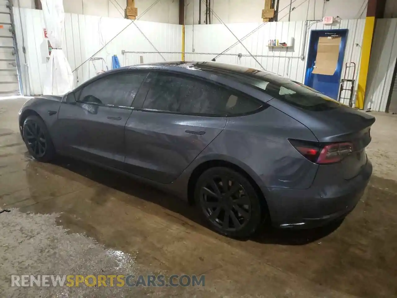 2 Photograph of a damaged car 5YJ3E1EB9NF335622 TESLA MODEL 3 2022