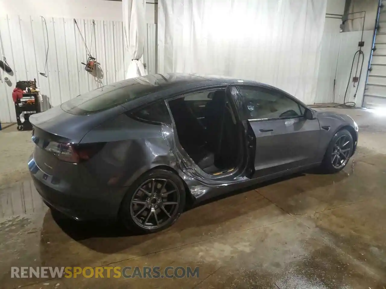 3 Photograph of a damaged car 5YJ3E1EB9NF335622 TESLA MODEL 3 2022