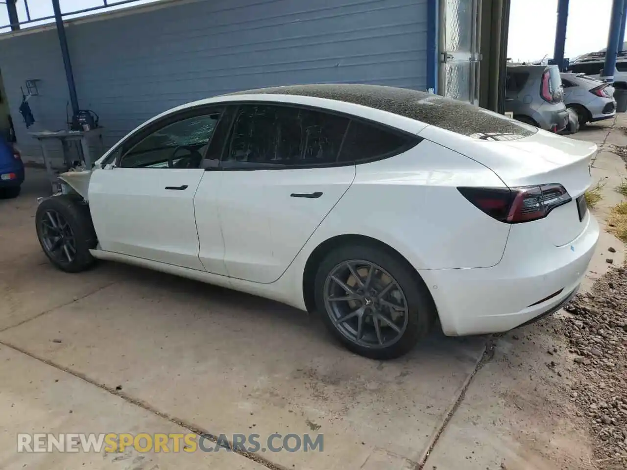 2 Photograph of a damaged car 5YJ3E1EB9NF350010 TESLA MODEL 3 2022