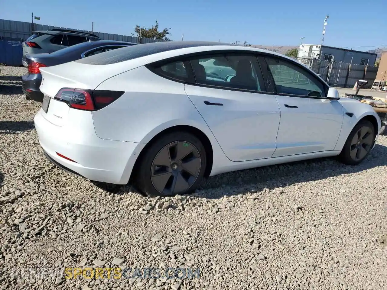 3 Photograph of a damaged car 5YJ3E1EB9NF359600 TESLA MODEL 3 2022
