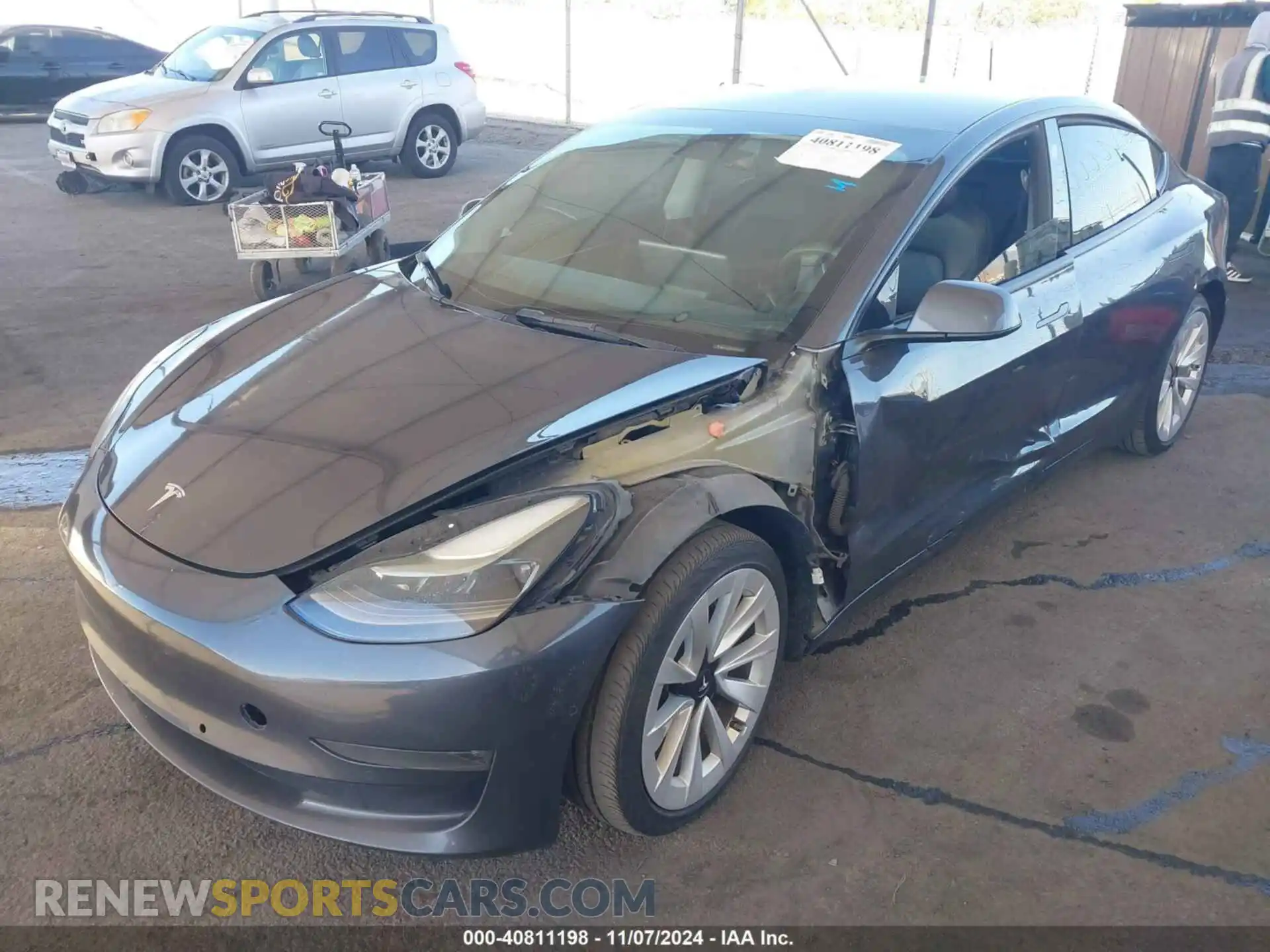 2 fotografías del automóvil dañado 5YJ3E1EBXNF124073 TESLA MODEL 3 2022