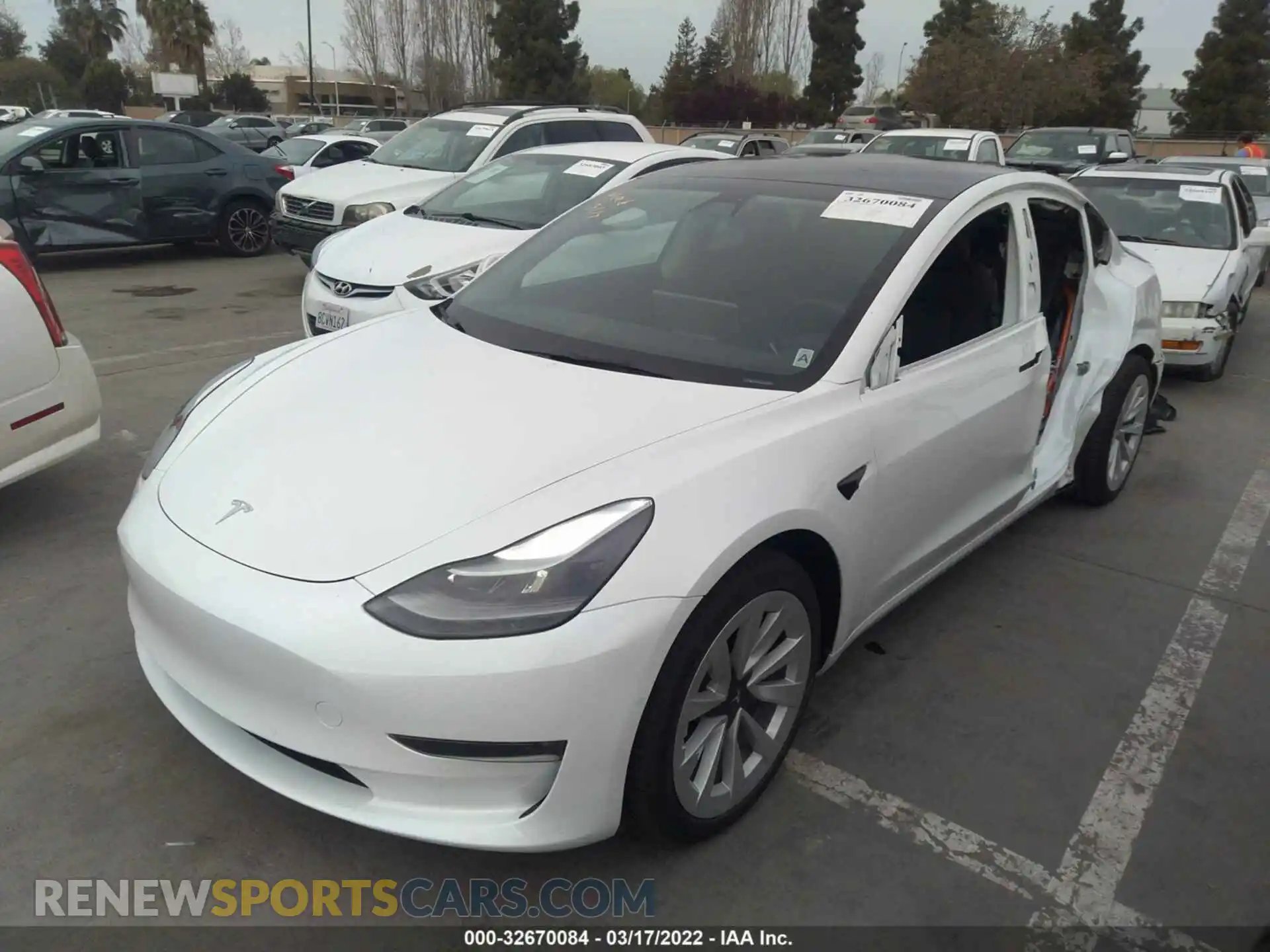 2 Photograph of a damaged car 5YJ3E1EBXNF128981 TESLA MODEL 3 2022