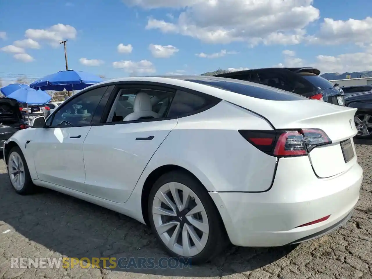 2 Photograph of a damaged car 5YJ3E1EBXNF129967 TESLA MODEL 3 2022