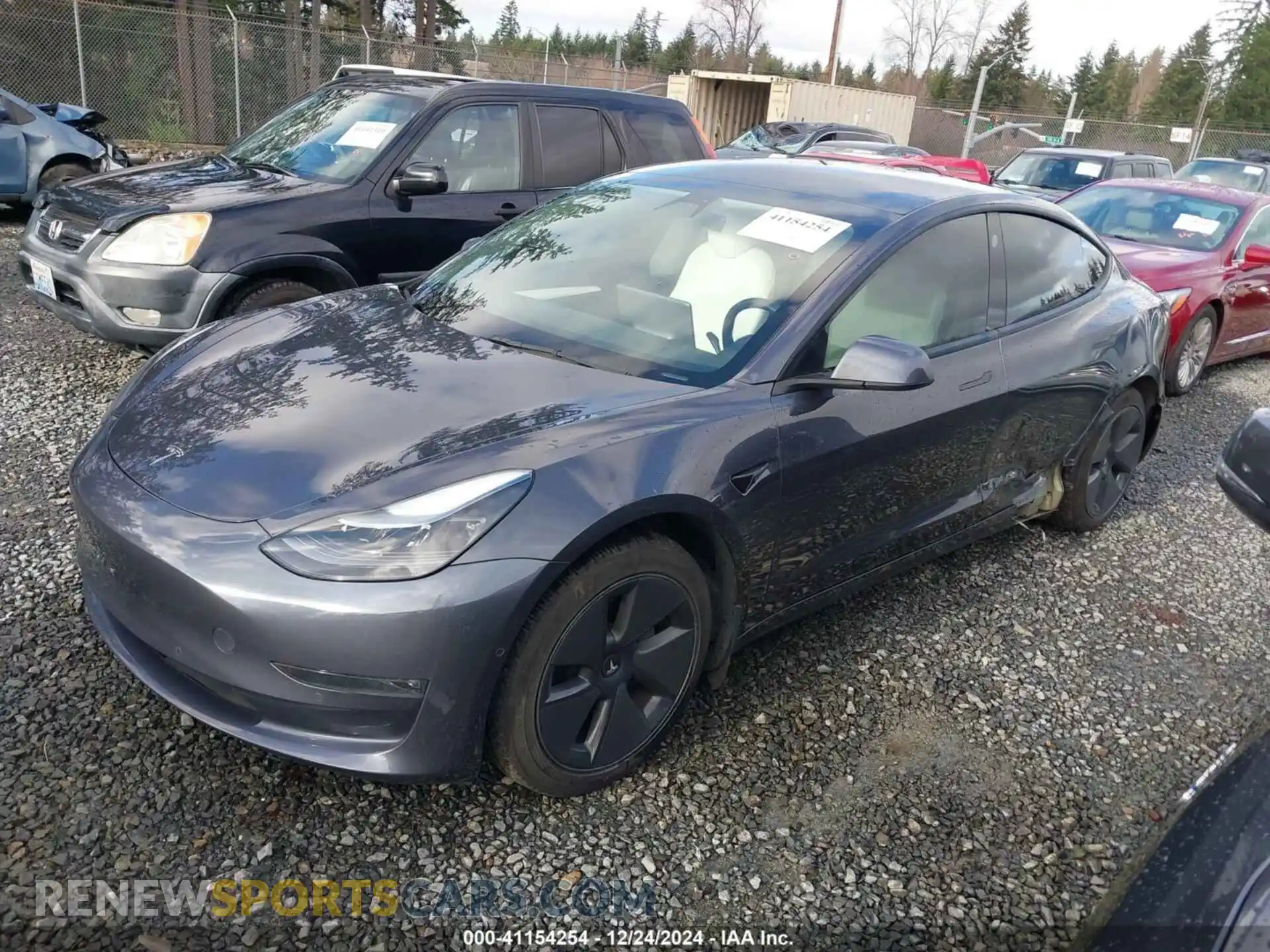2 Photograph of a damaged car 5YJ3E1EBXNF138815 TESLA MODEL 3 2022