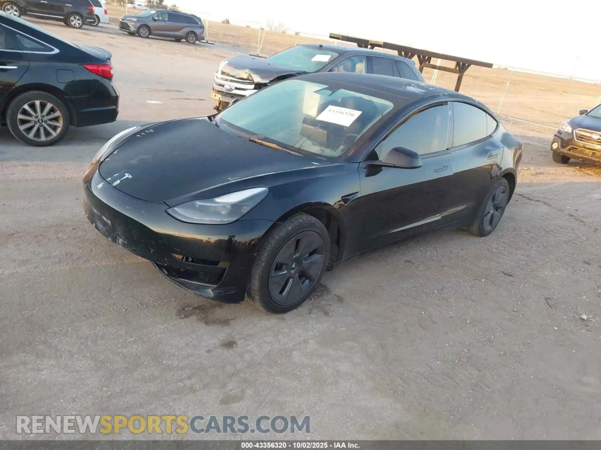 2 Photograph of a damaged car 5YJ3E1EBXNF152195 TESLA MODEL 3 2022