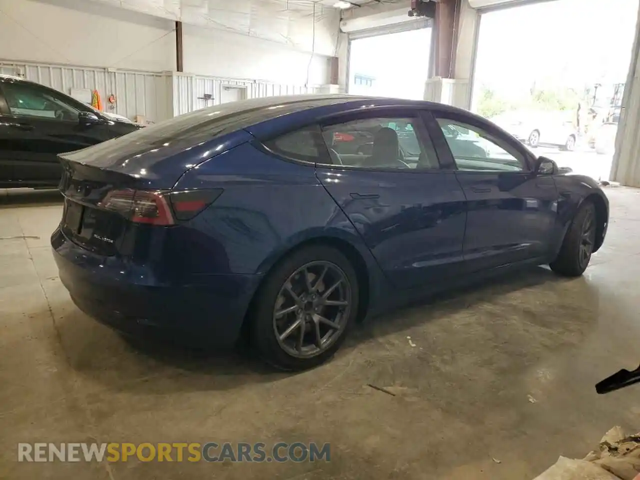 3 Photograph of a damaged car 5YJ3E1EBXNF189084 TESLA MODEL 3 2022