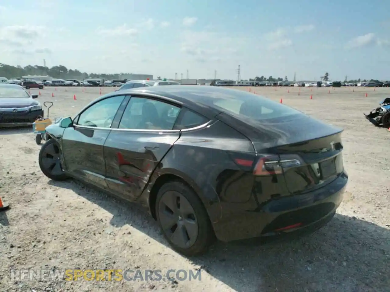 3 Photograph of a damaged car 5YJ3E1EBXNF190994 TESLA MODEL 3 2022