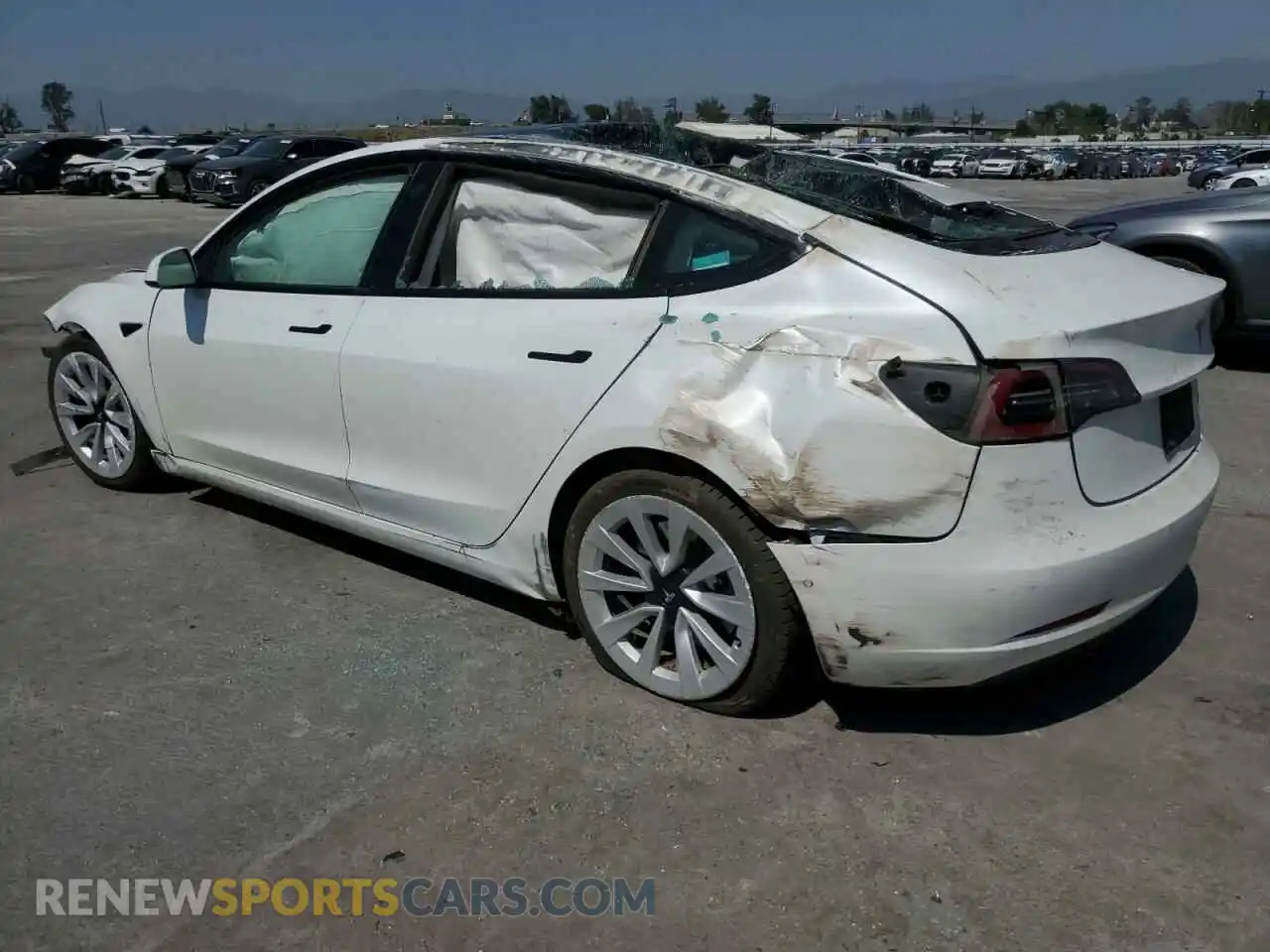 2 Photograph of a damaged car 5YJ3E1EBXNF211018 TESLA MODEL 3 2022