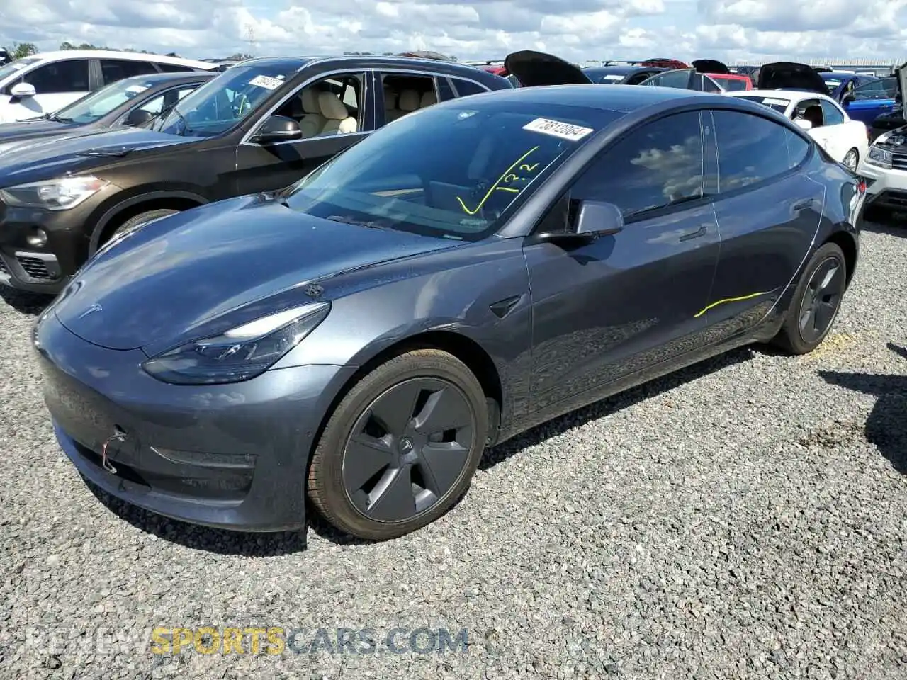 1 Photograph of a damaged car 5YJ3E1EBXNF287404 TESLA MODEL 3 2022