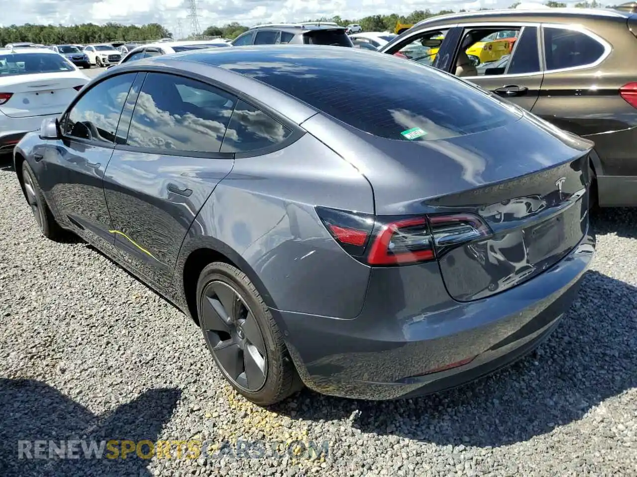 2 Photograph of a damaged car 5YJ3E1EBXNF287404 TESLA MODEL 3 2022