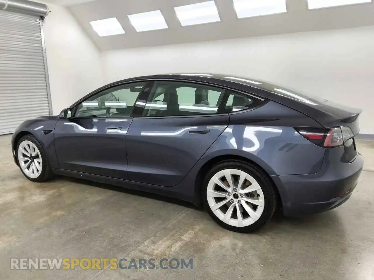 2 Photograph of a damaged car 5YJ3E1EBXNF287662 TESLA MODEL 3 2022