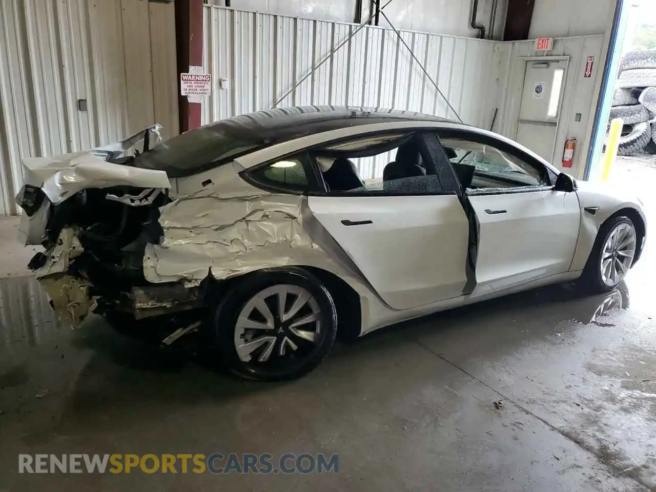 3 Photograph of a damaged car 5YJ3E1EBXNF291355 TESLA MODEL 3 2022